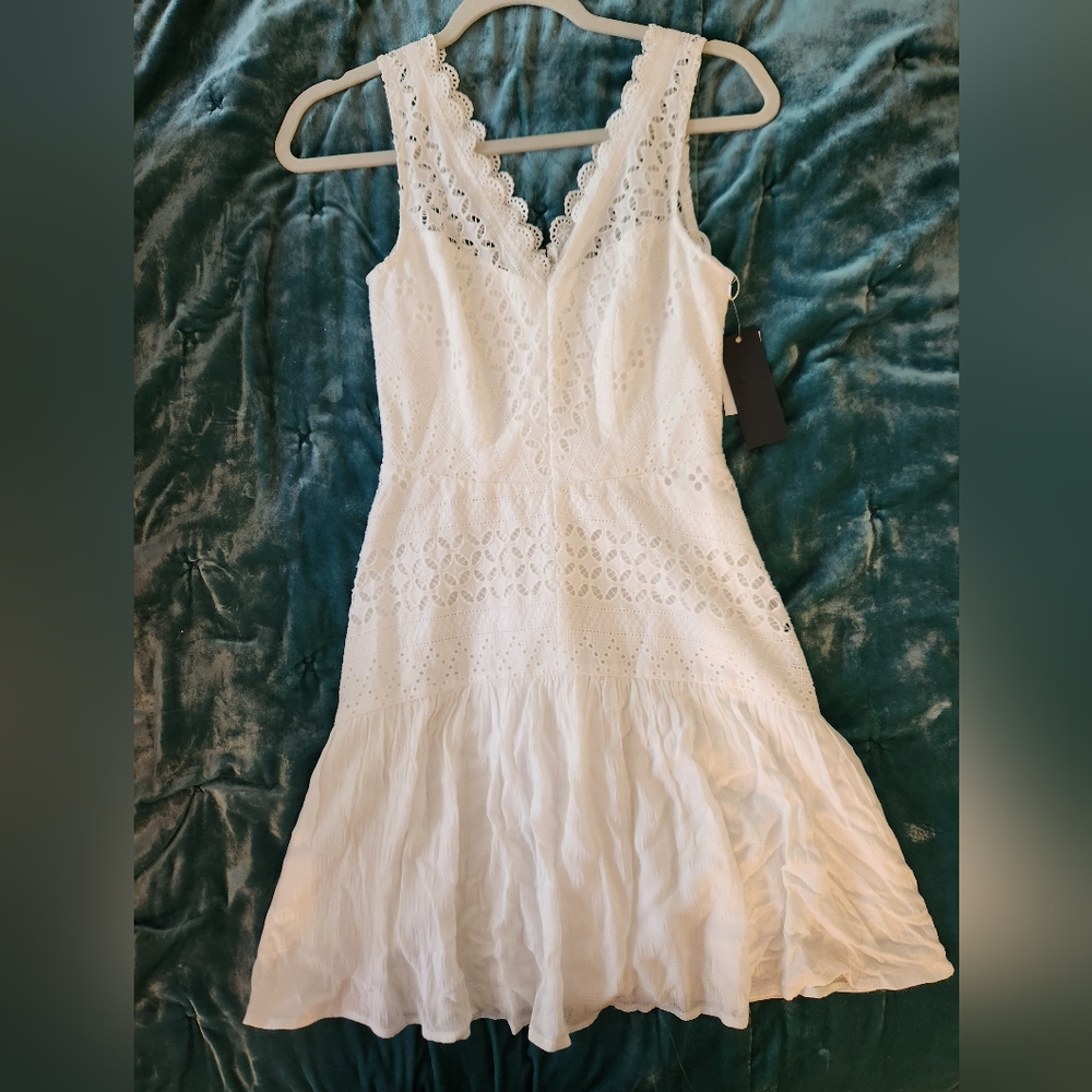 White lace dress with zip up back. Size S/3.